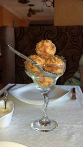 Cheese balls with ham and melted cheese inside.  Delish.  Love the presentation!